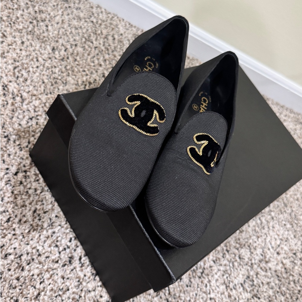 Chanel Black and Gold canvas loafers with Sleek Design
